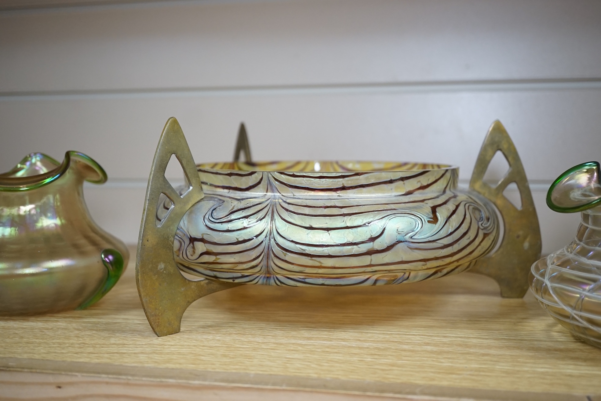 An Otto Tham iridescent glass centrepiece on brass stand, probably designed by Friedrich Wilhelm Heckert and two Pallme König glass vases, centrepiece 20cm diameter not including stand. Condition - good